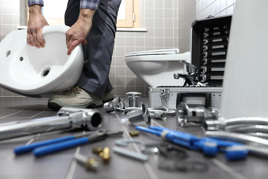 Plumbing tools prepared for a bathroom repair in Cocoa